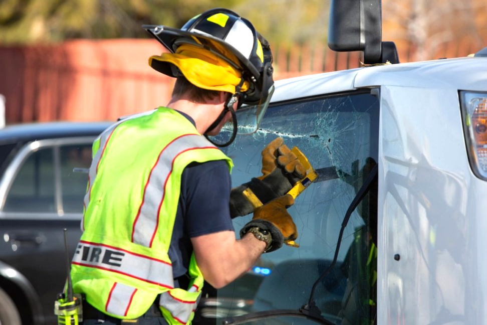 Refugio Tx Car Accident Lawyer Dans Emergency Responder Sawing Through Window On Mini Van